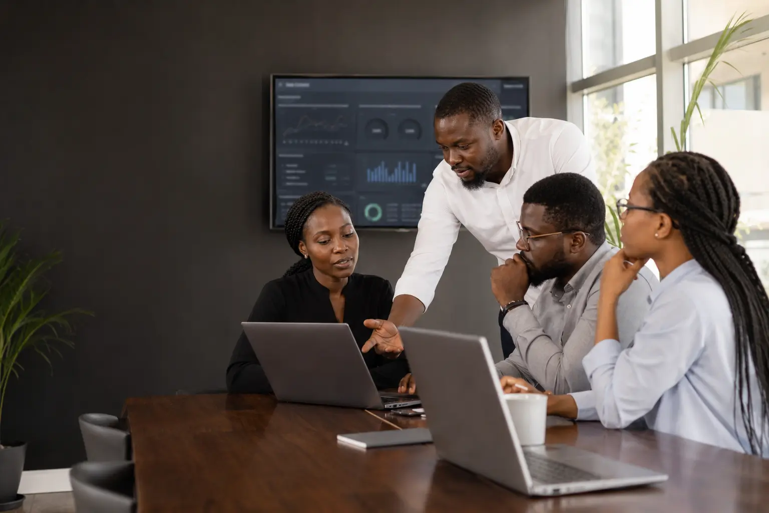 Ghanaian technology professionals collaborating during an enterprise systems workshop
